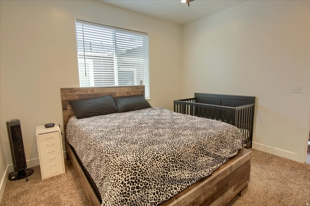 Bedroom featuring carpet