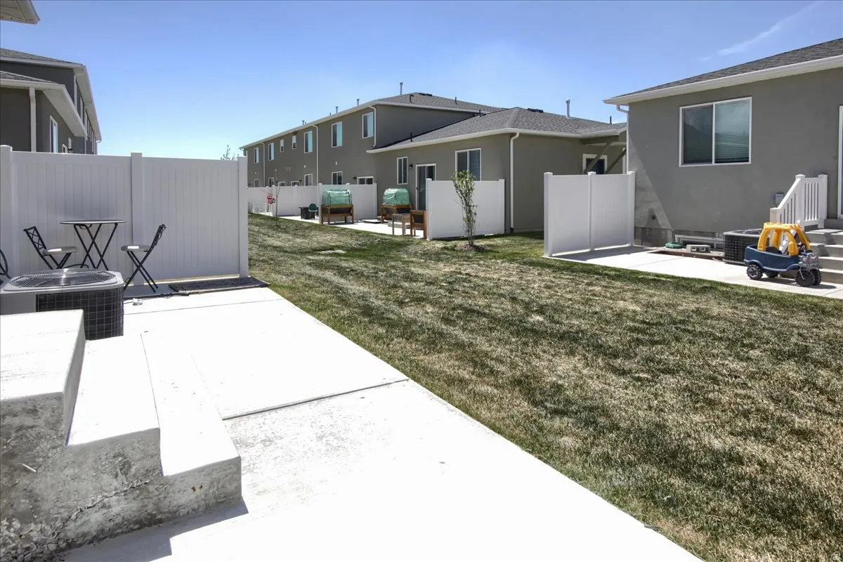 Fenced yard with a patio