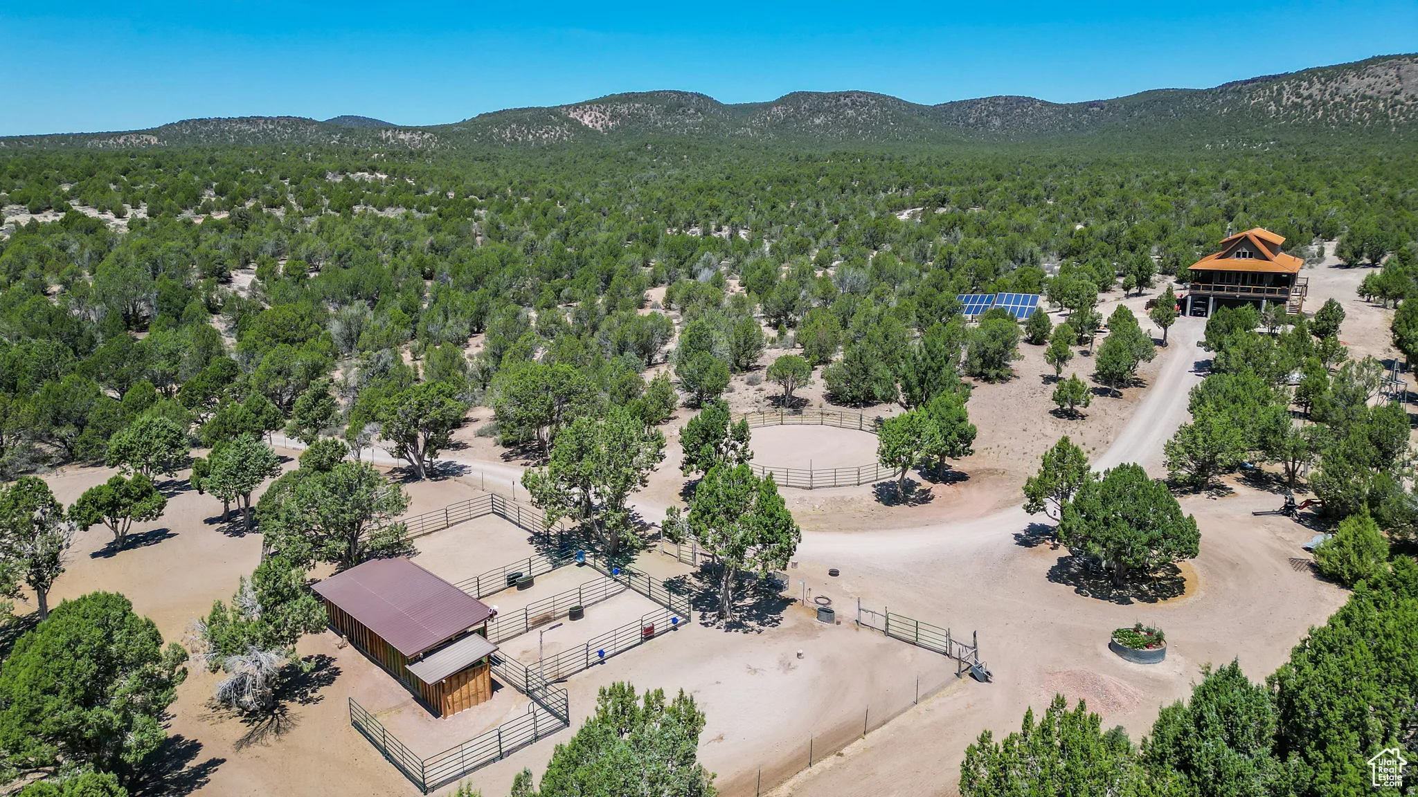 Bird's eye view of mountains and a heavily wooded area