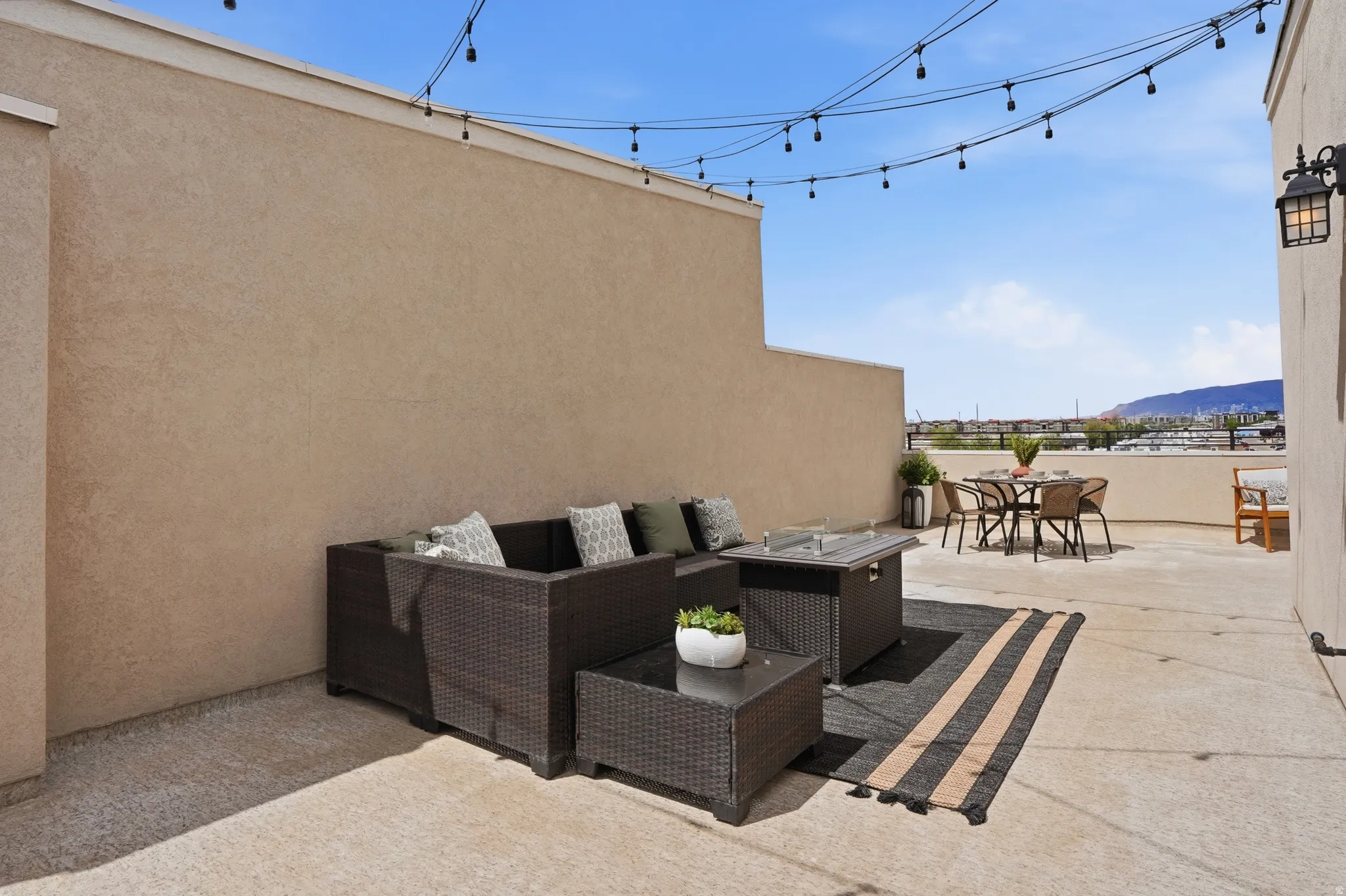 View of patio / terrace featuring an outdoor living space and a mountain view