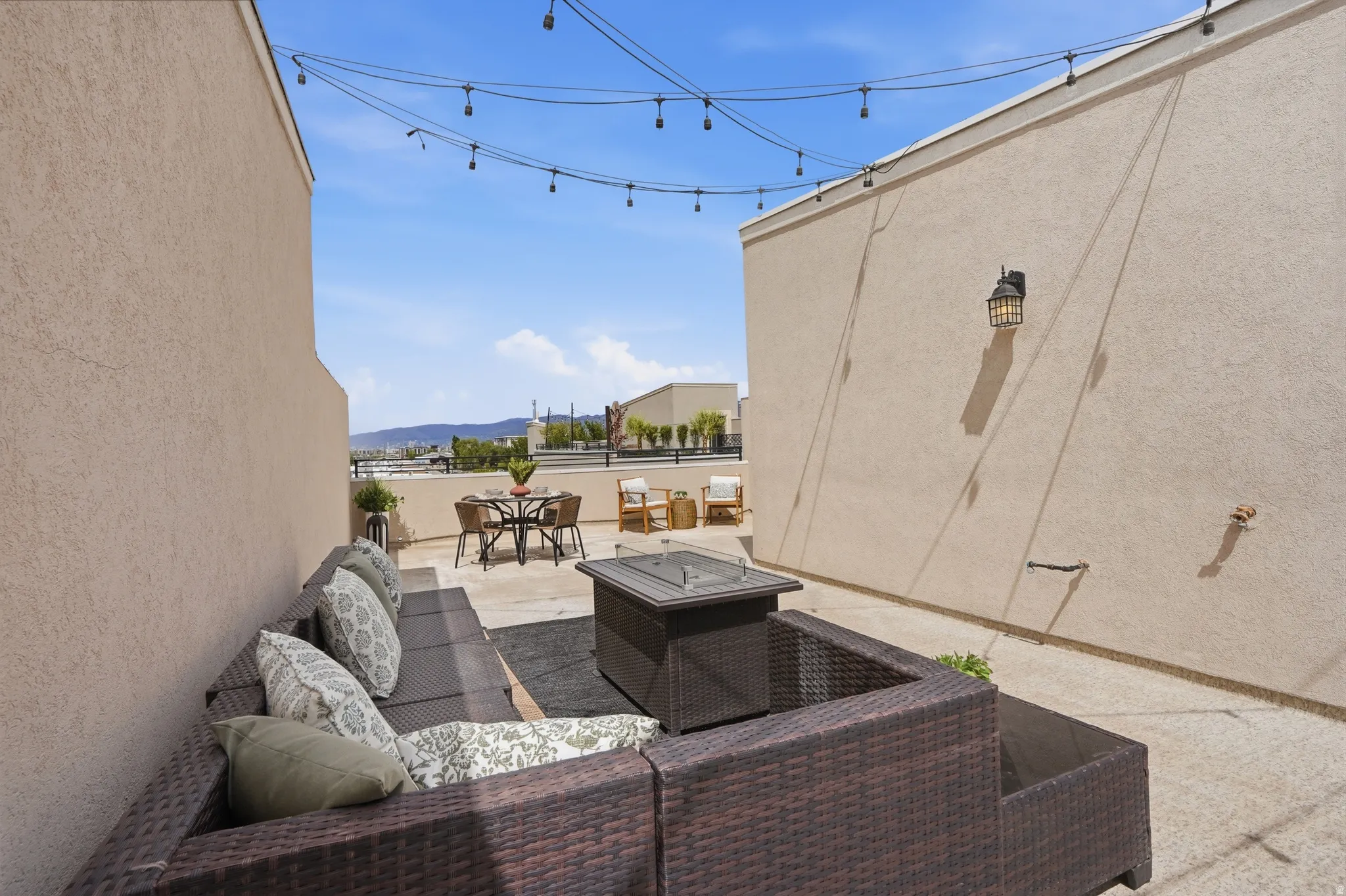 View of patio featuring an outdoor hangout area and a mountain view