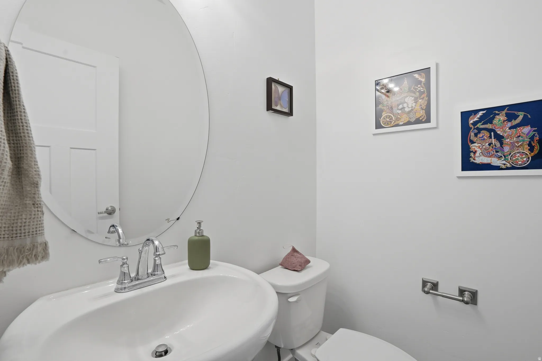 Bathroom with a sink and toilet