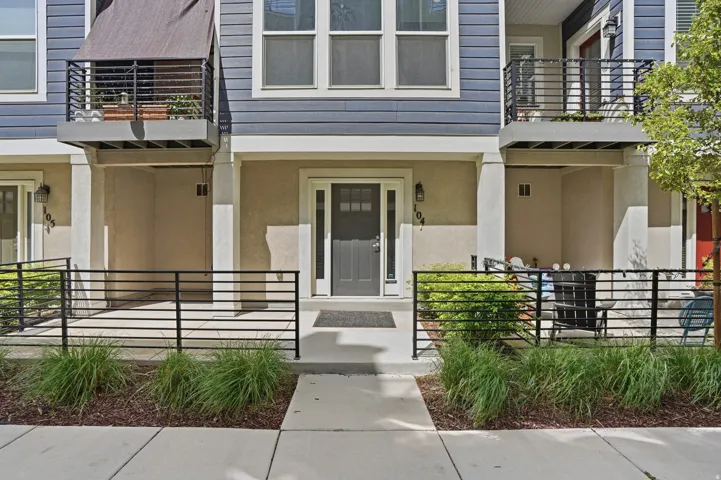 Doorway to property with stucco siding