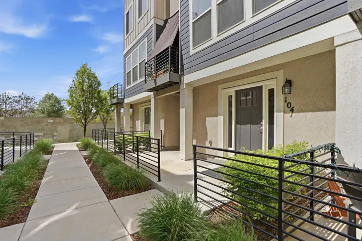 View of exterior entry featuring stucco siding