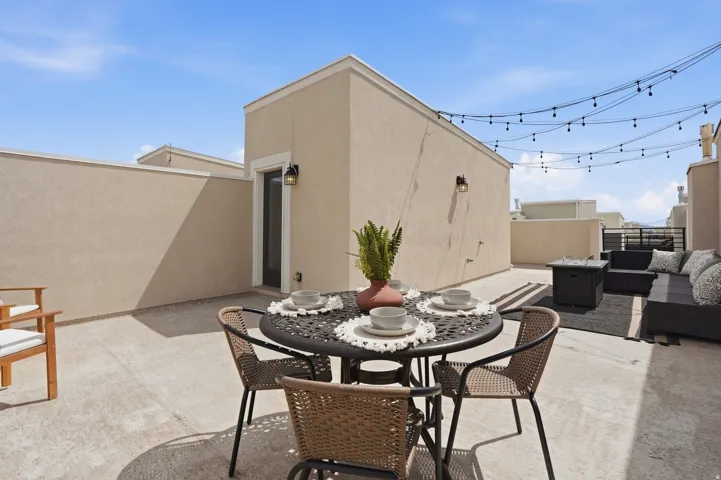 View of patio / terrace with an outdoor living / dining area