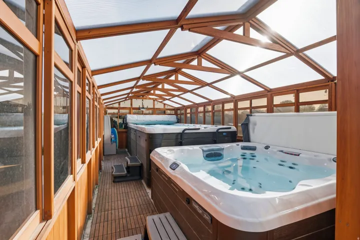 Exterior space featuring a hot tub