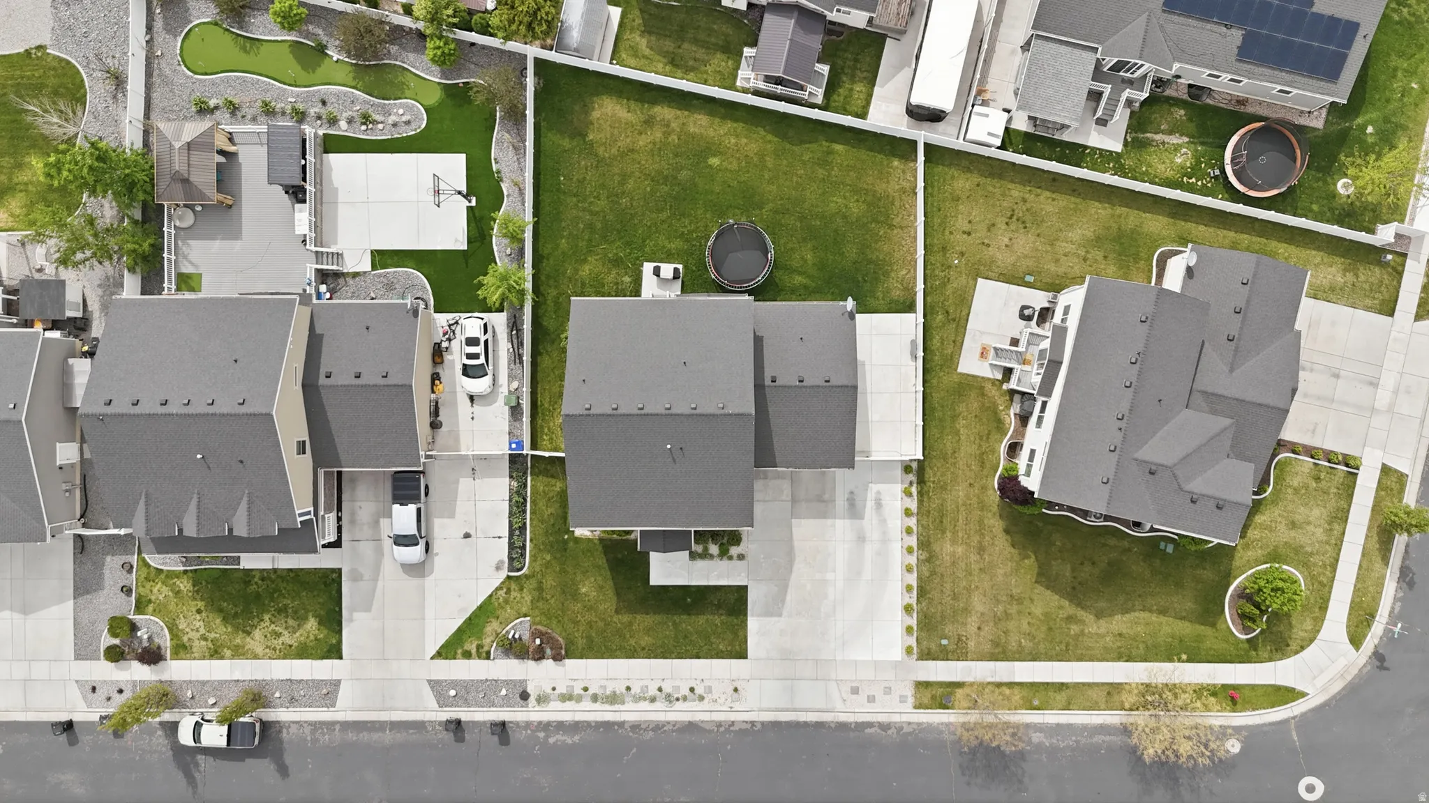 Aerial perspective of suburban area with property boundaries highlighted