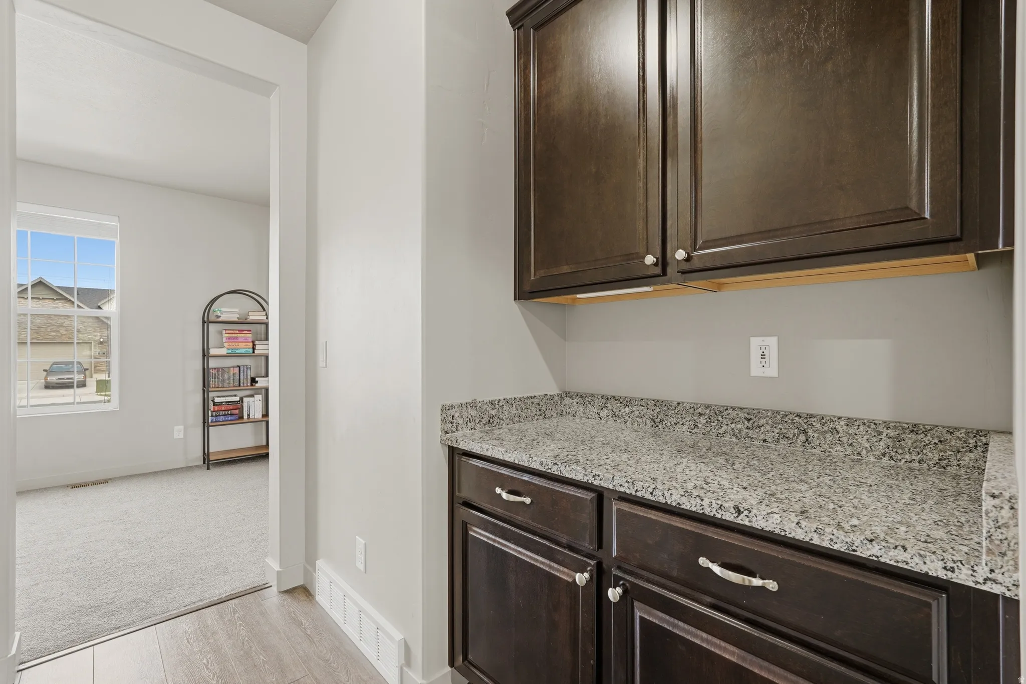 Hall storage between kitchen and flex room