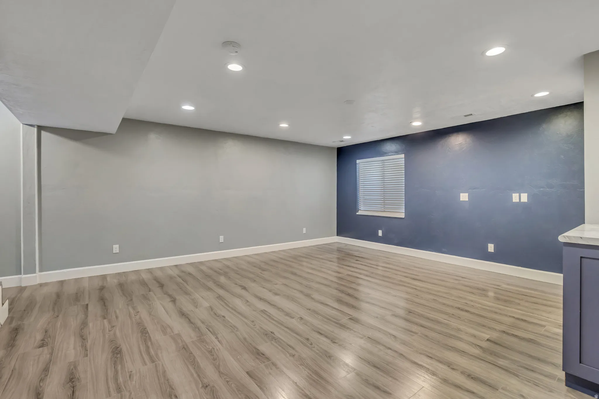 Unfurnished room featuring recessed lighting and light wood finished floors