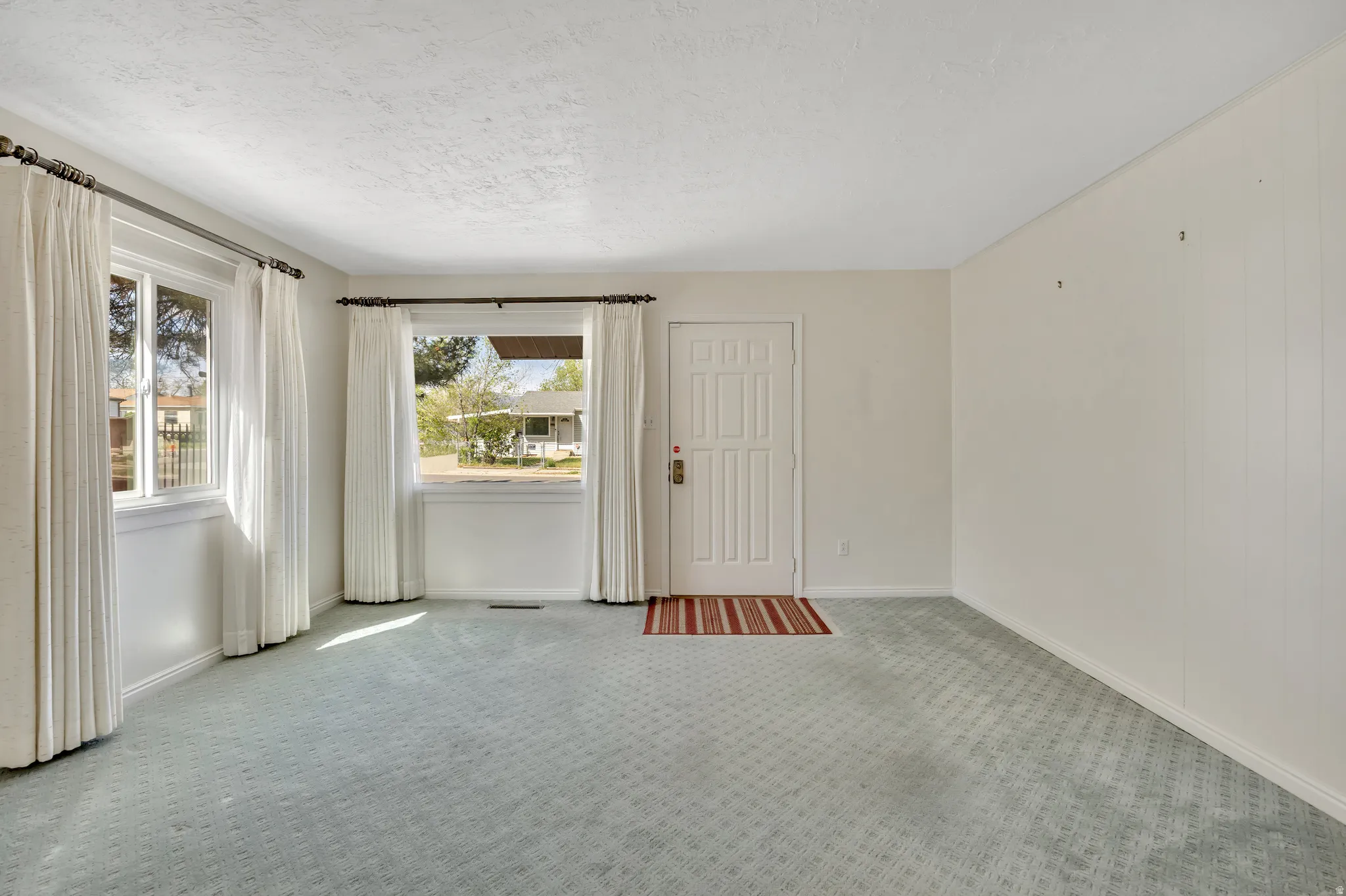 Front door entrance into the family room on the main level