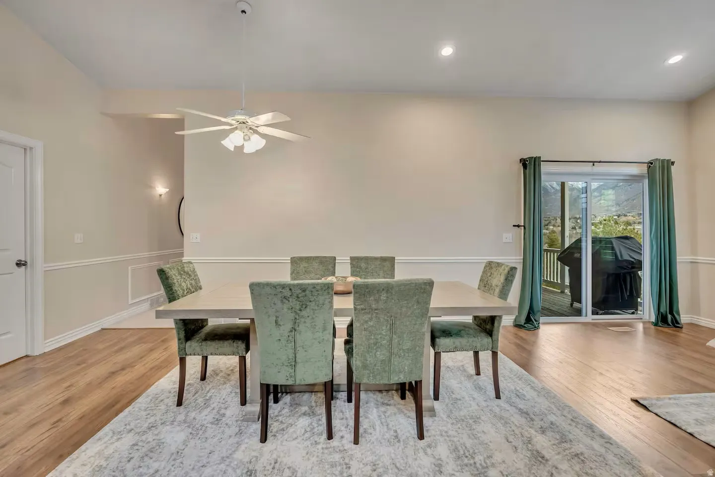 Dining room featuring a ceiling fan, light wood-style floors, and recessed lighting