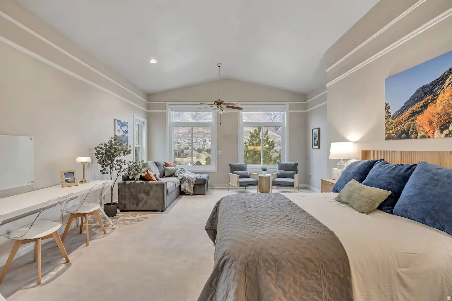 Bedroom featuring vaulted ceiling and carpet flooring