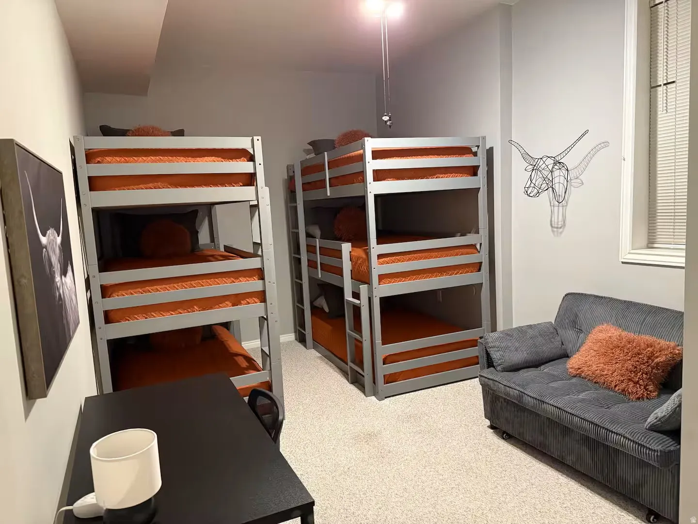 Bedroom featuring light colored carpet