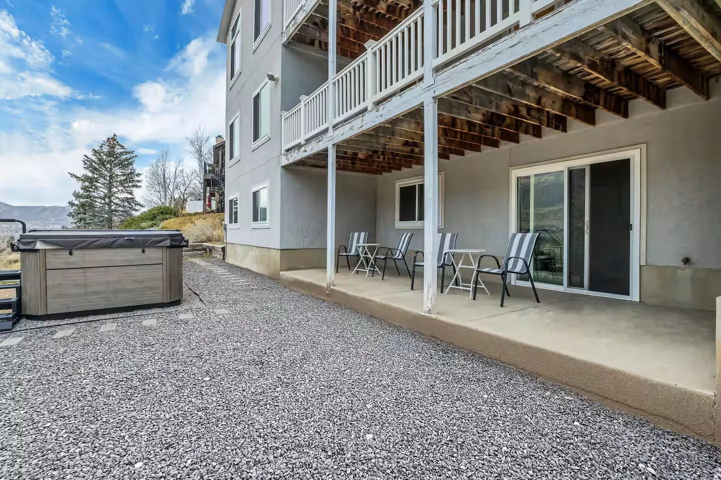 Patio / terrace with a patio and a hot tub