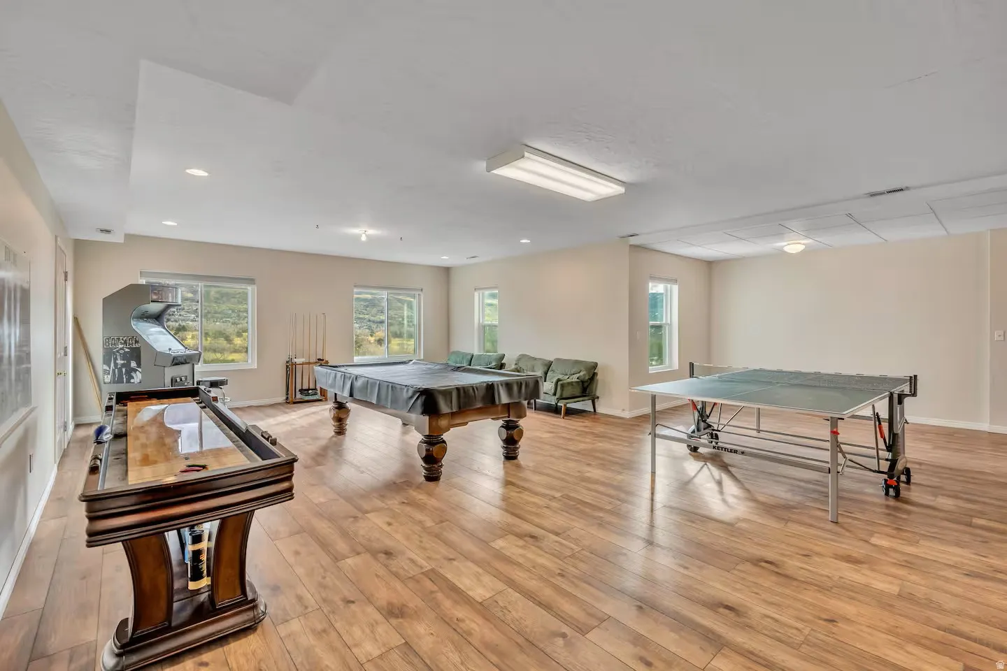 Playroom featuring plenty of natural light and billiards table