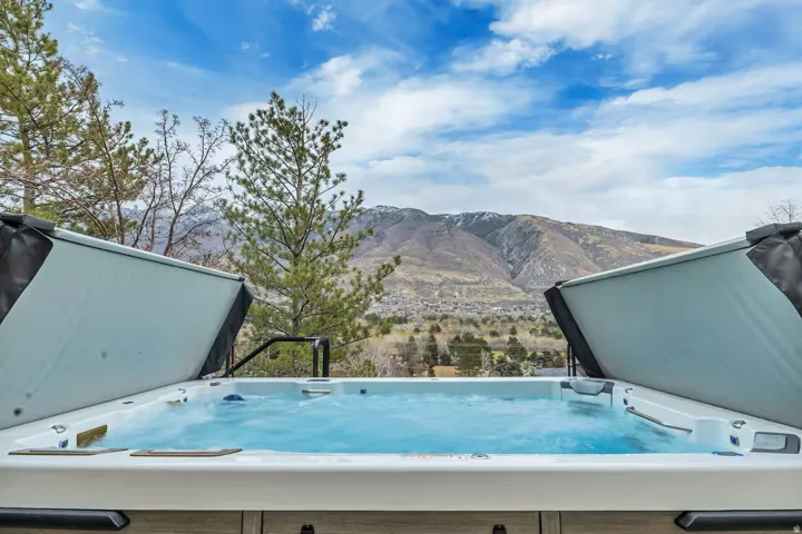 Exterior view of mountains and a jacuzzi