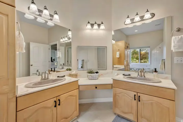 Bathroom featuring double vanity