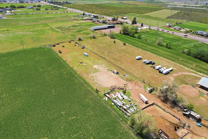 Aerial view of property's location featuring large plots for crops and rural landscape