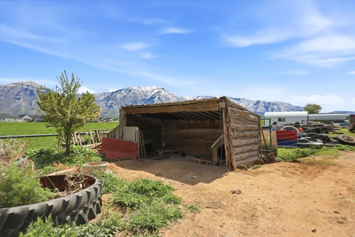 View of outbuilding featuring a mountain view