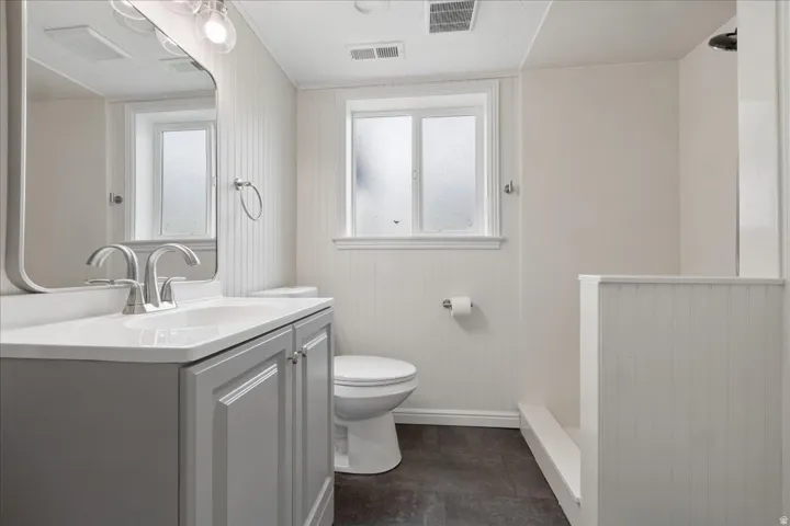 Full bath featuring vanity and walk in shower
