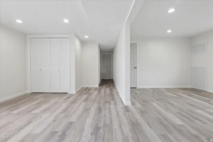 Interior space featuring light wood finished floors and recessed lighting