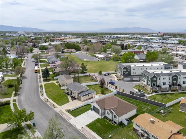 Aerial view of residential area featuring mountains