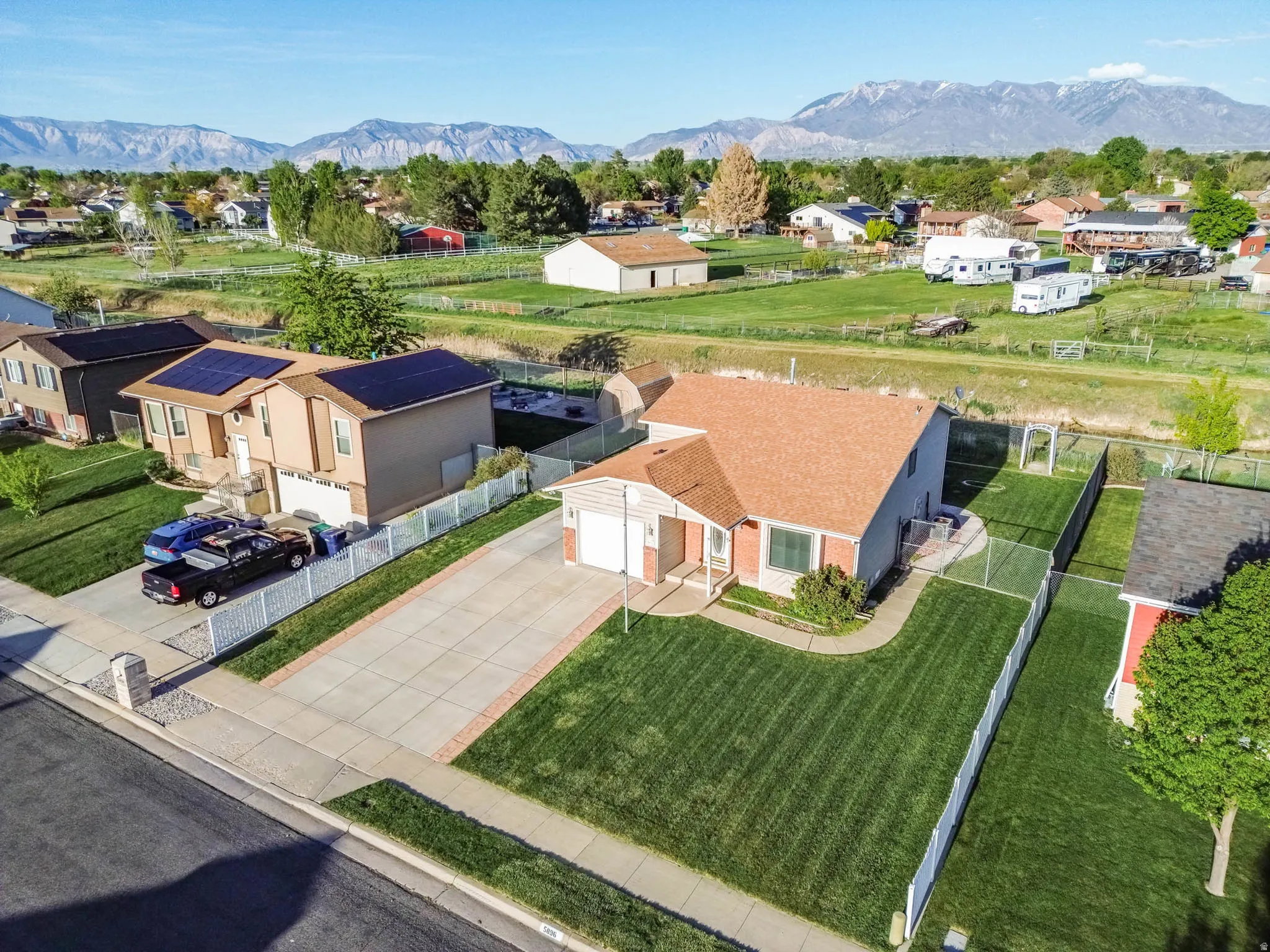 Aerial perspective of suburban area with mountains