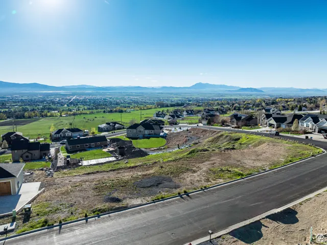 Aerial view of residential area featuring mountains