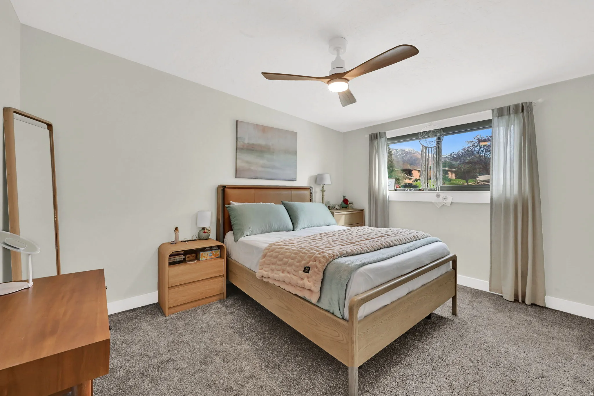 Bedroom featuring carpet floors and ceiling fan