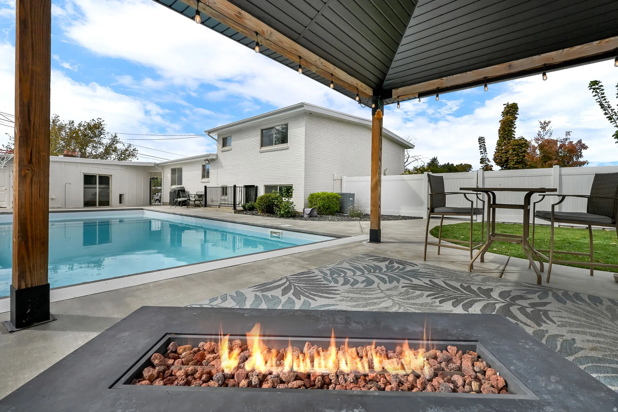 View of pool with a patio area