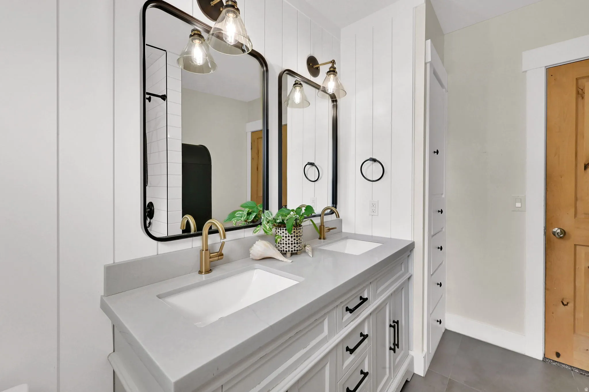 Full bathroom featuring double vanity