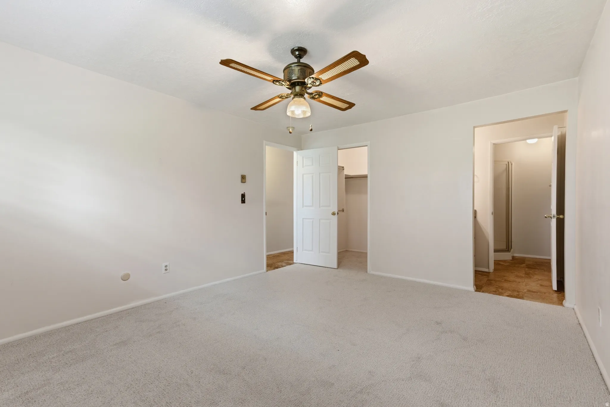 Primary Bedroom with Walk-In Closet, Private Bath.