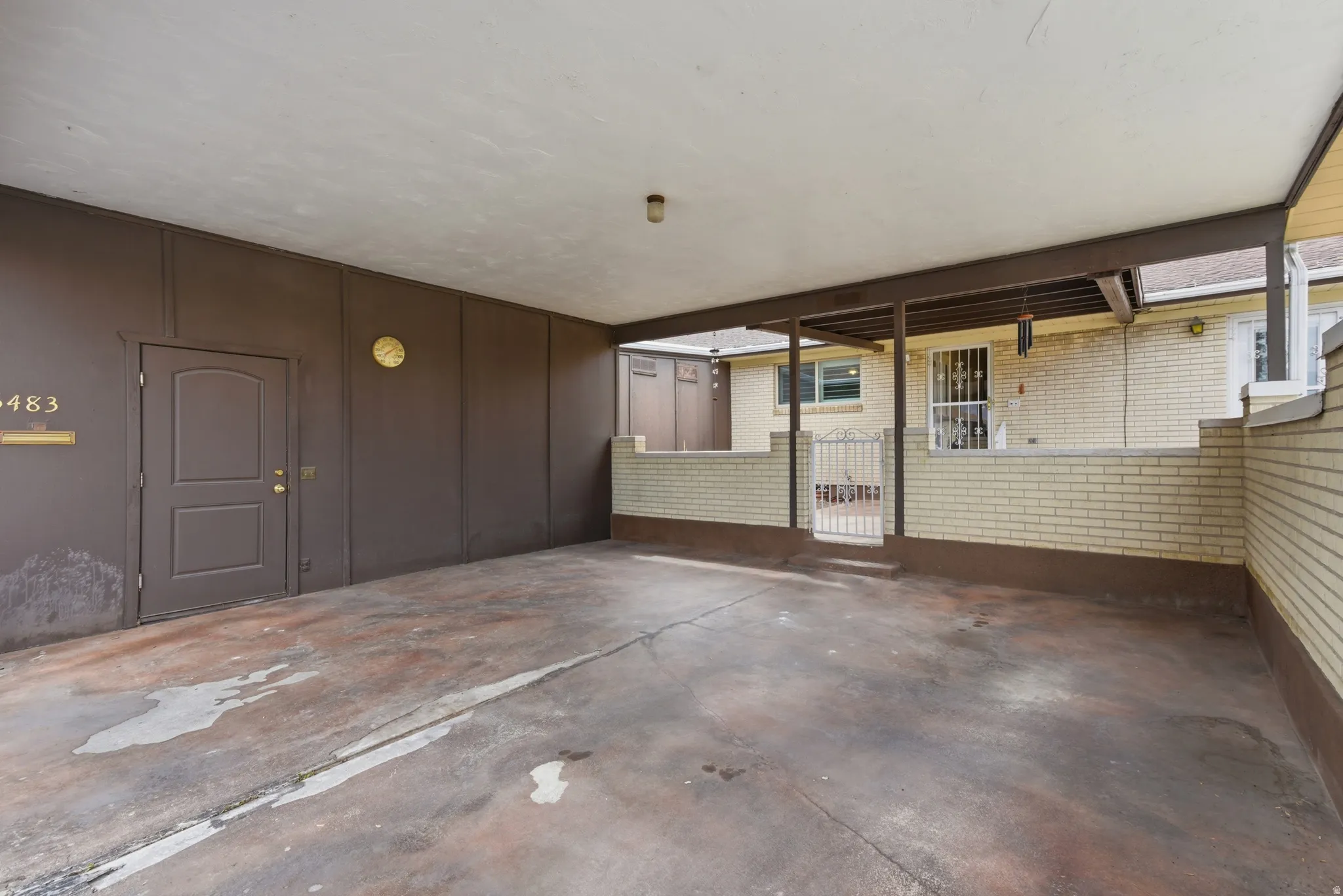 View of Covered Carport and Storage.
