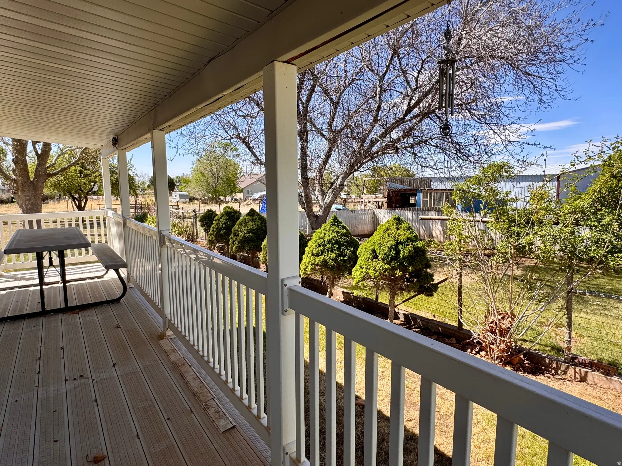 Wooden deck with a residential view