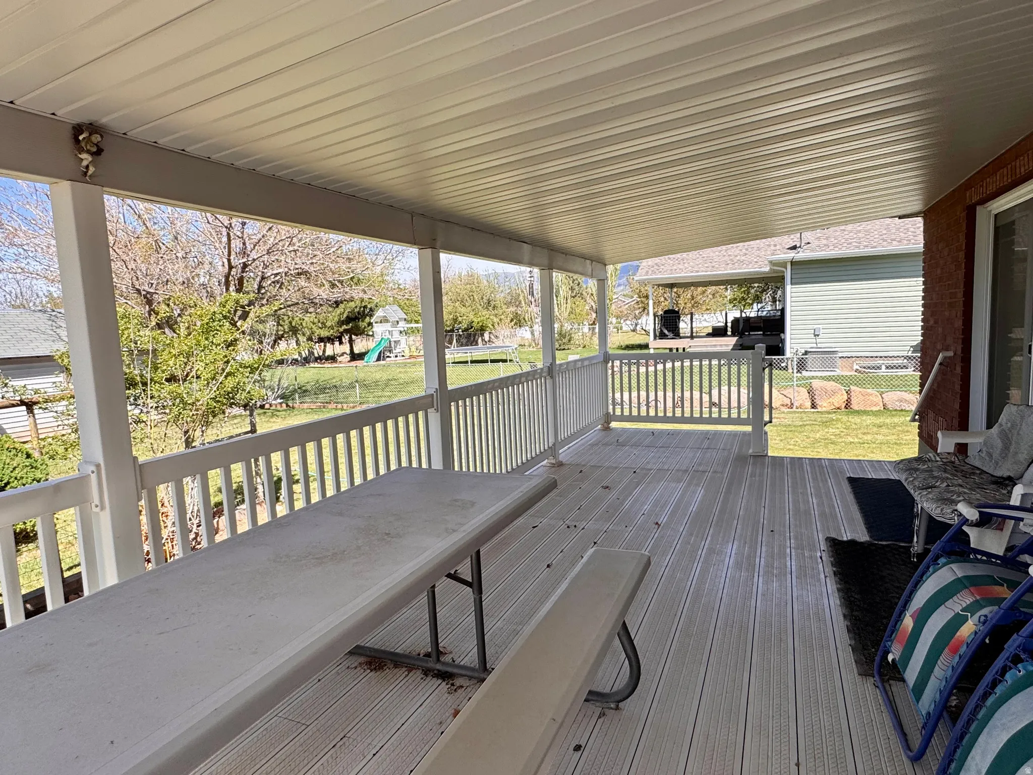 Wooden terrace with outdoor dining space