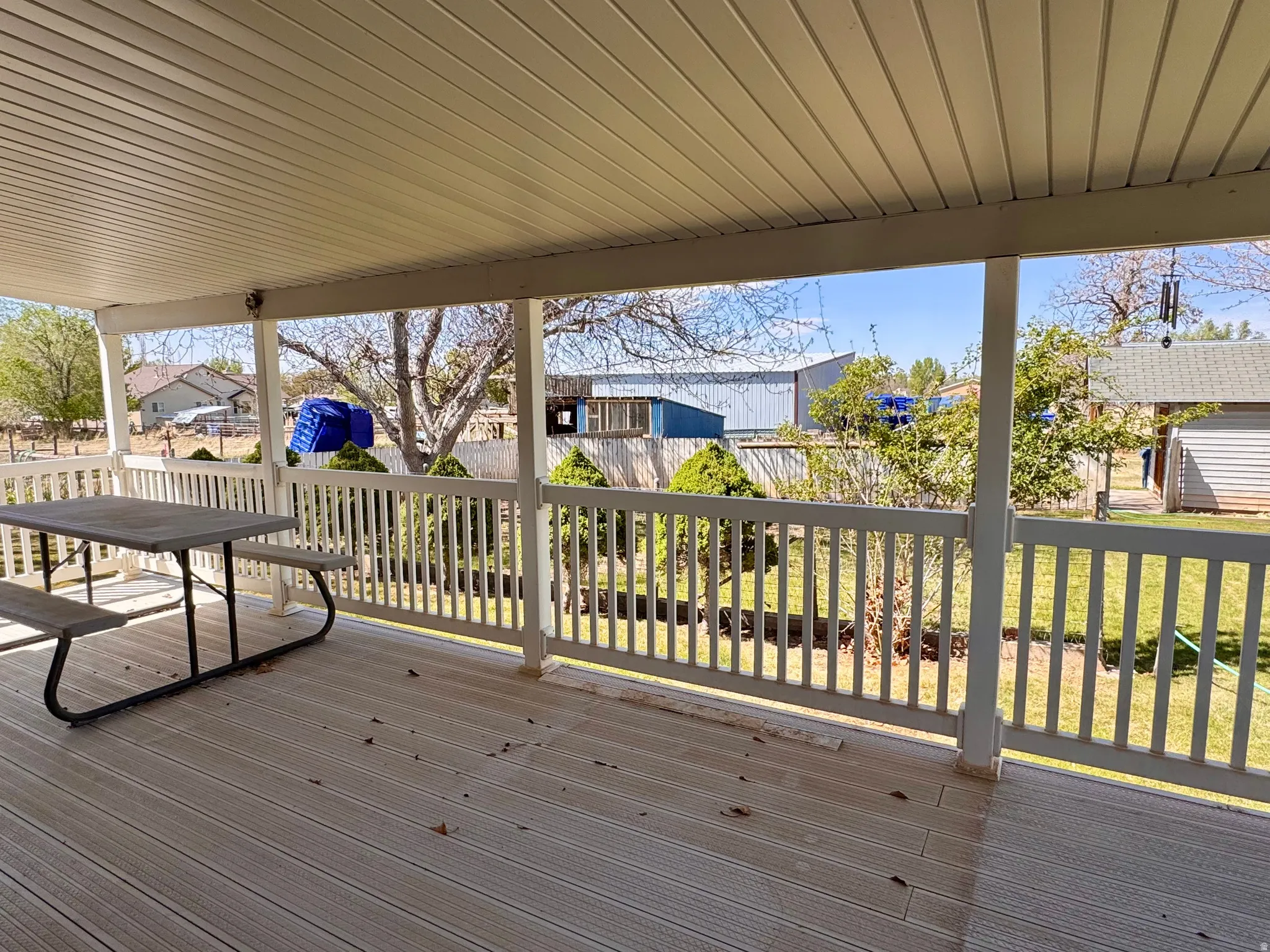 Wooden deck featuring a residential view