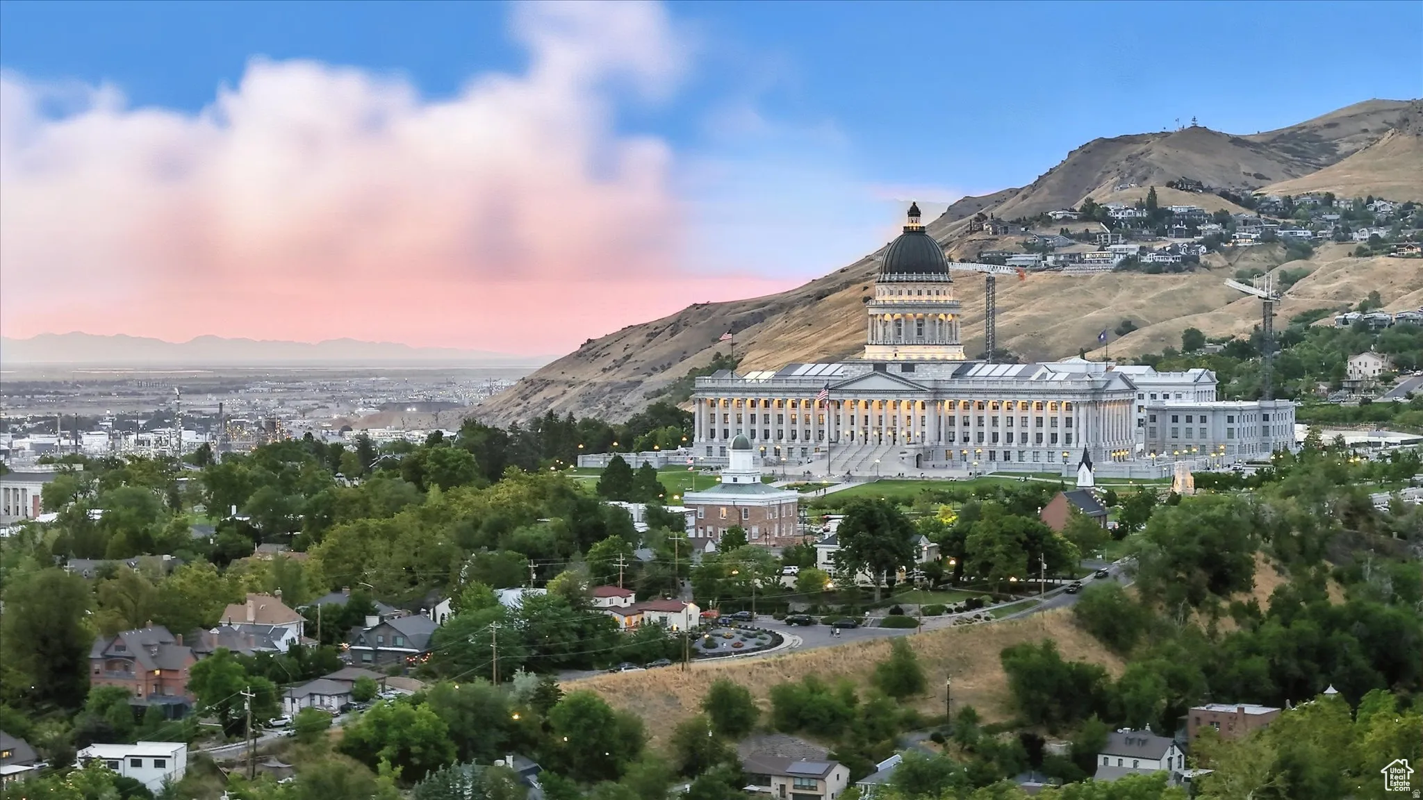 Aerial view at dusk of a mountain view and the Capitol Building
