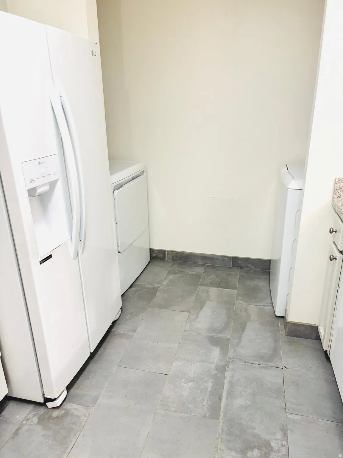 Laundry area featuring washer / dryer