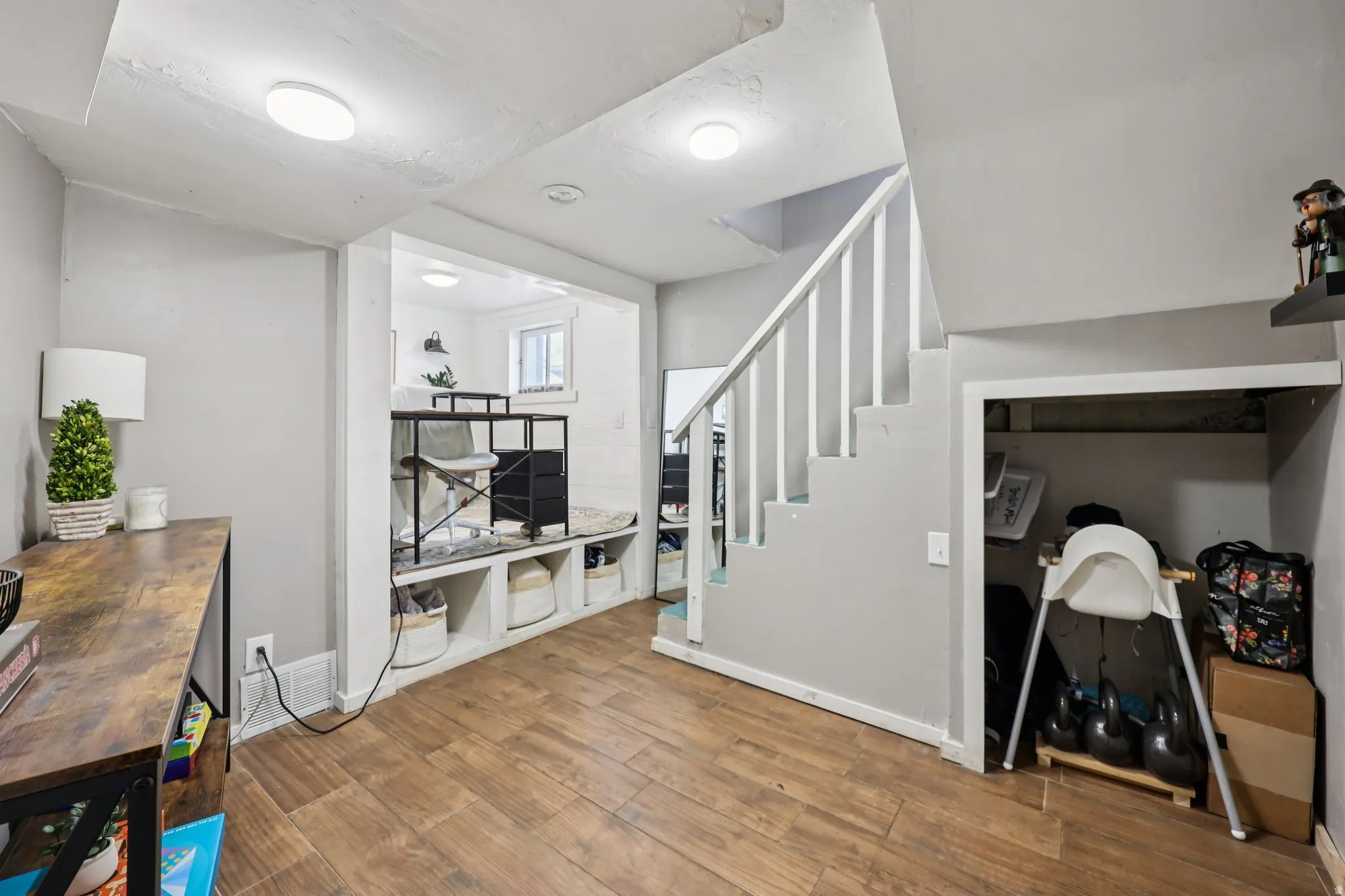 Entryway featuring light wood-style flooring and stairway