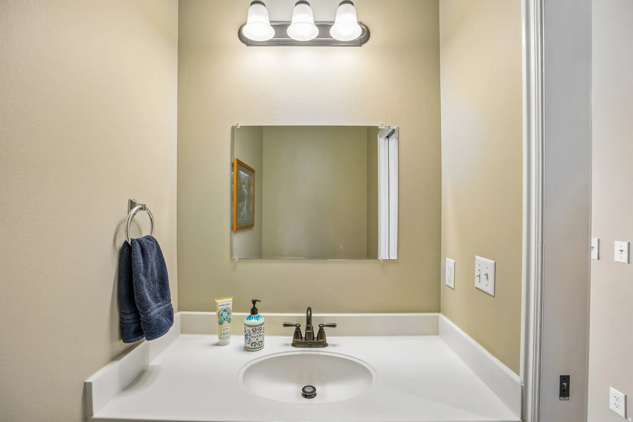 1/2 Bathroom featuring vanity