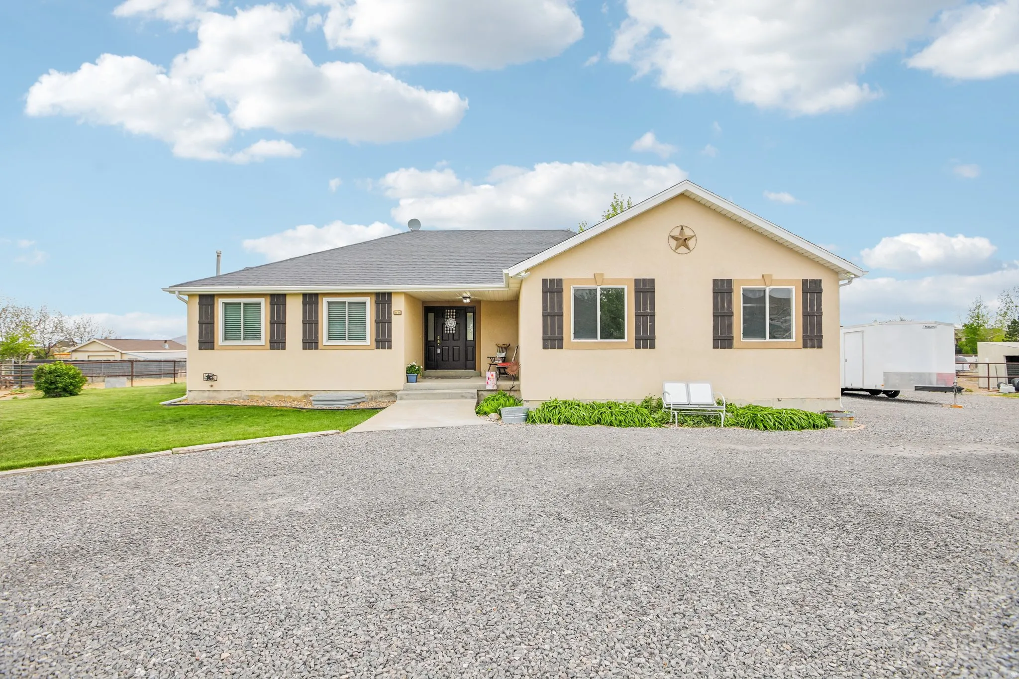 View of front of house with stucco