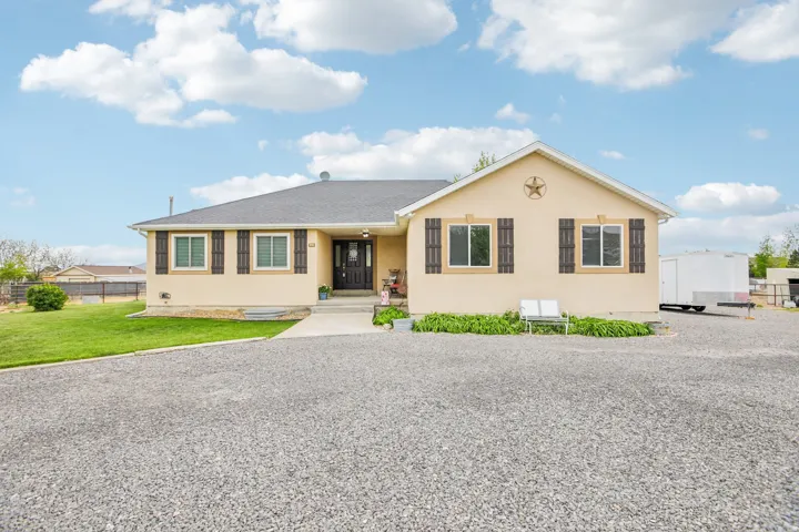 View of front of house with stucco