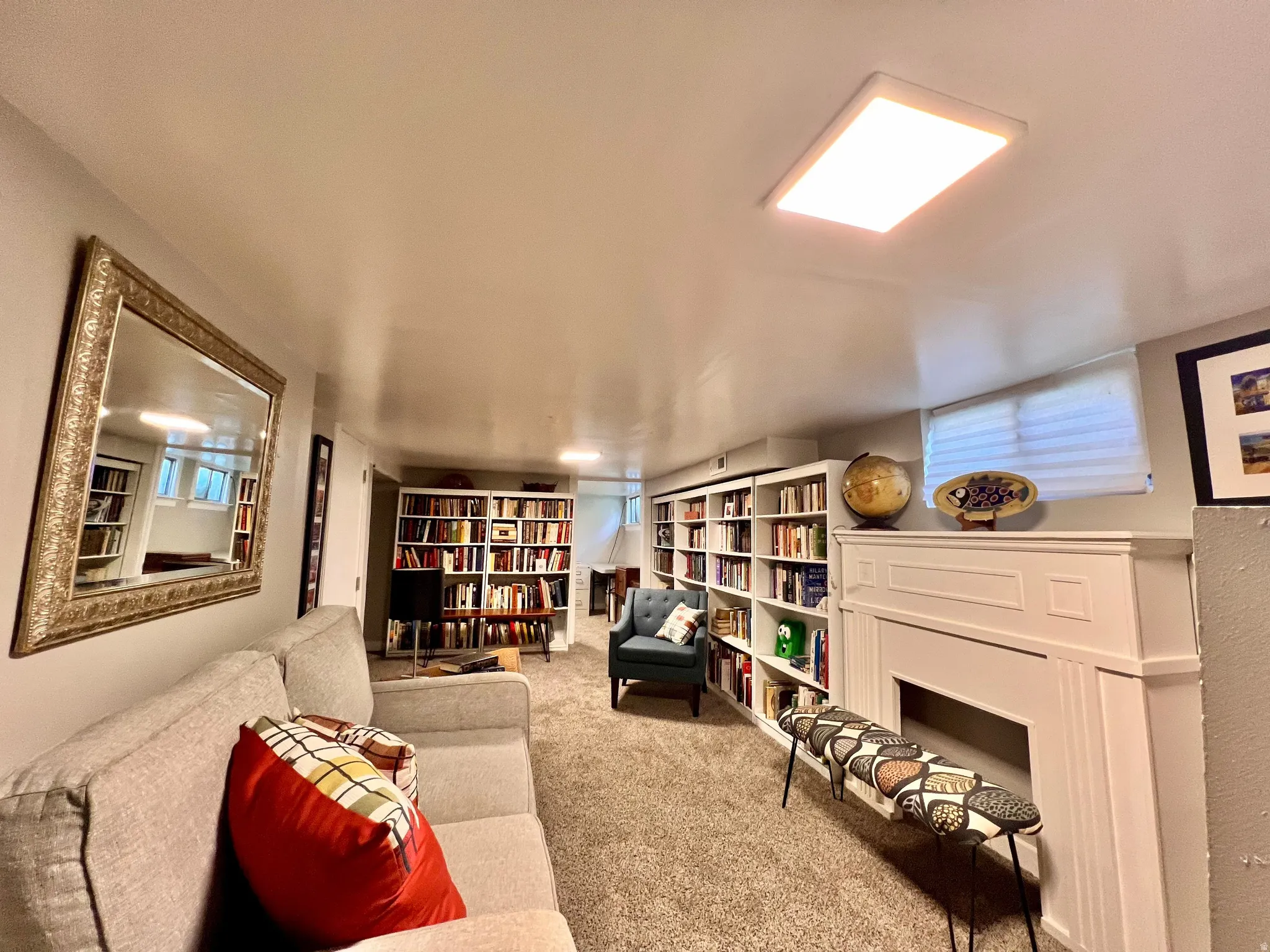 Living area with carpet floors
