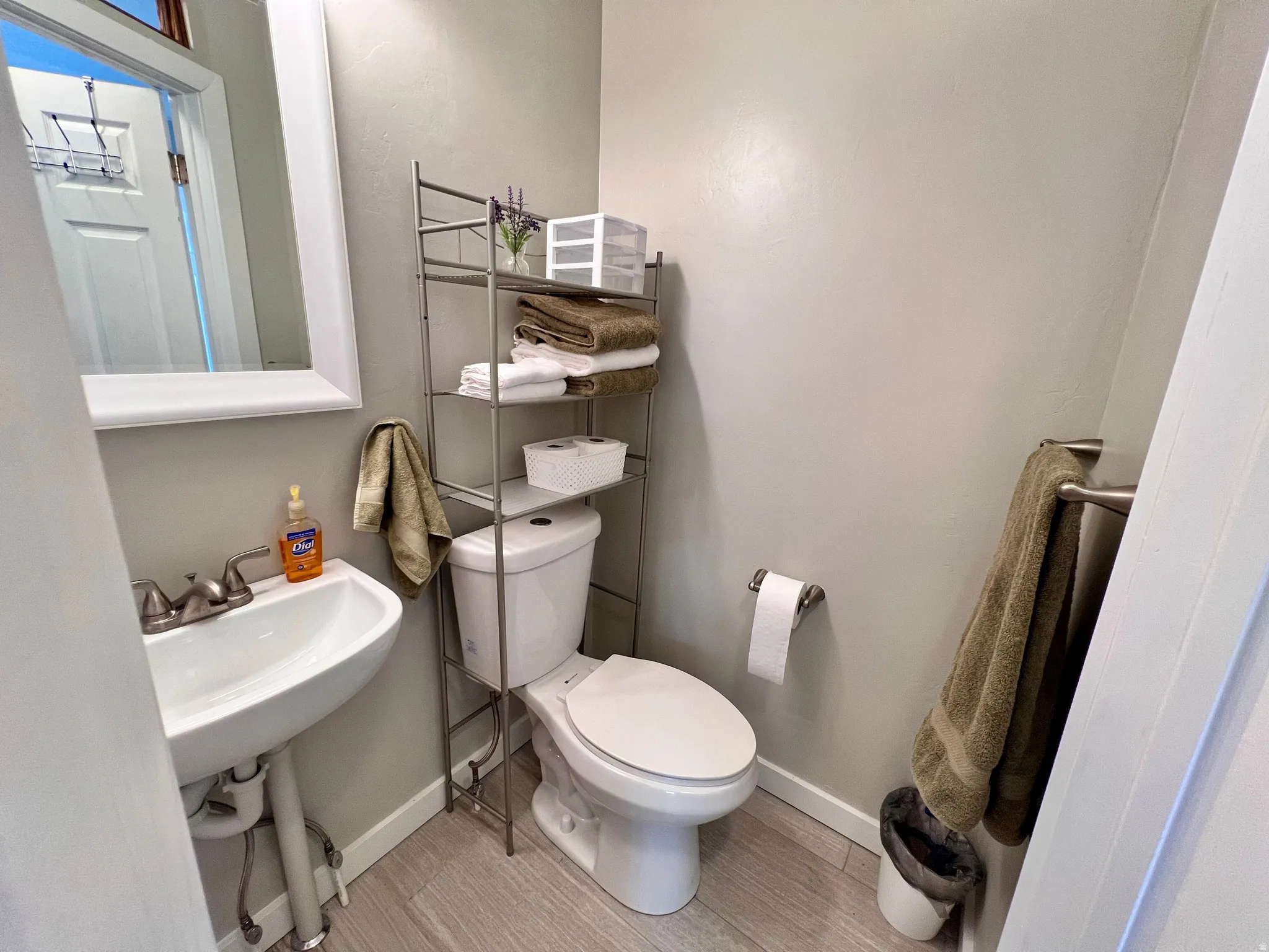 Bathroom with toilet and baseboards