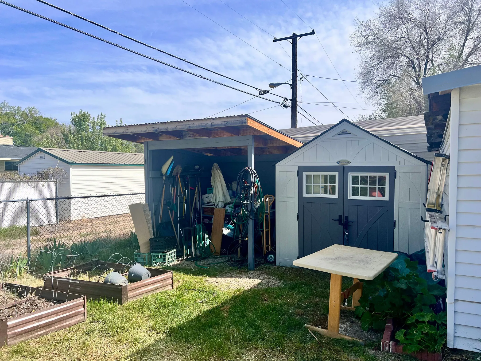 View of shed with a garden