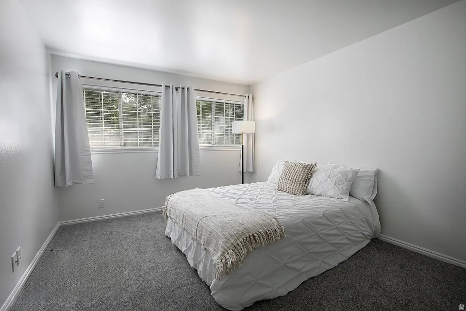 Primary Bedroom featuring carpet flooring