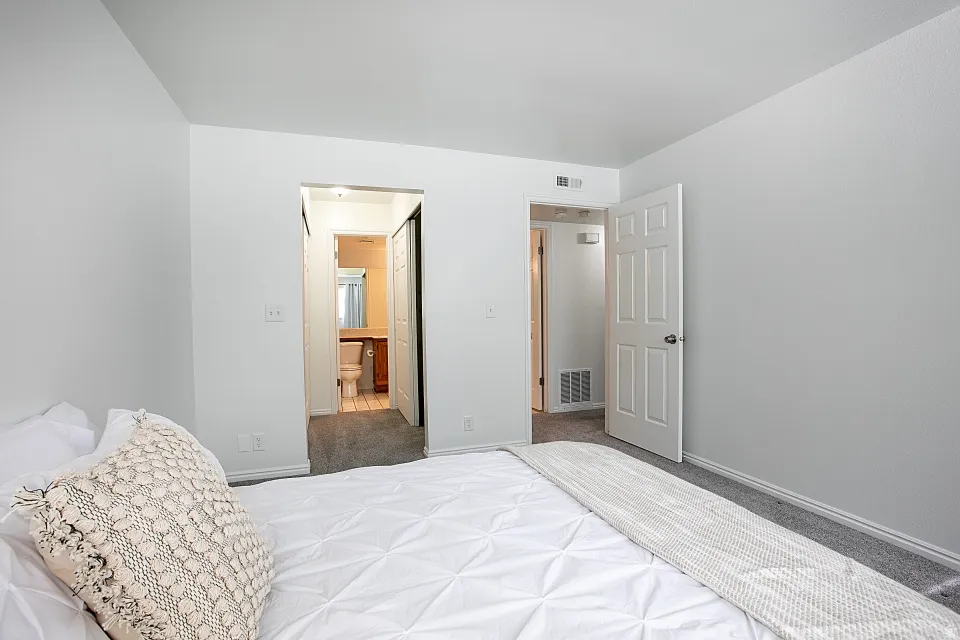 Primary bedroom with closet and separate access to bathroom