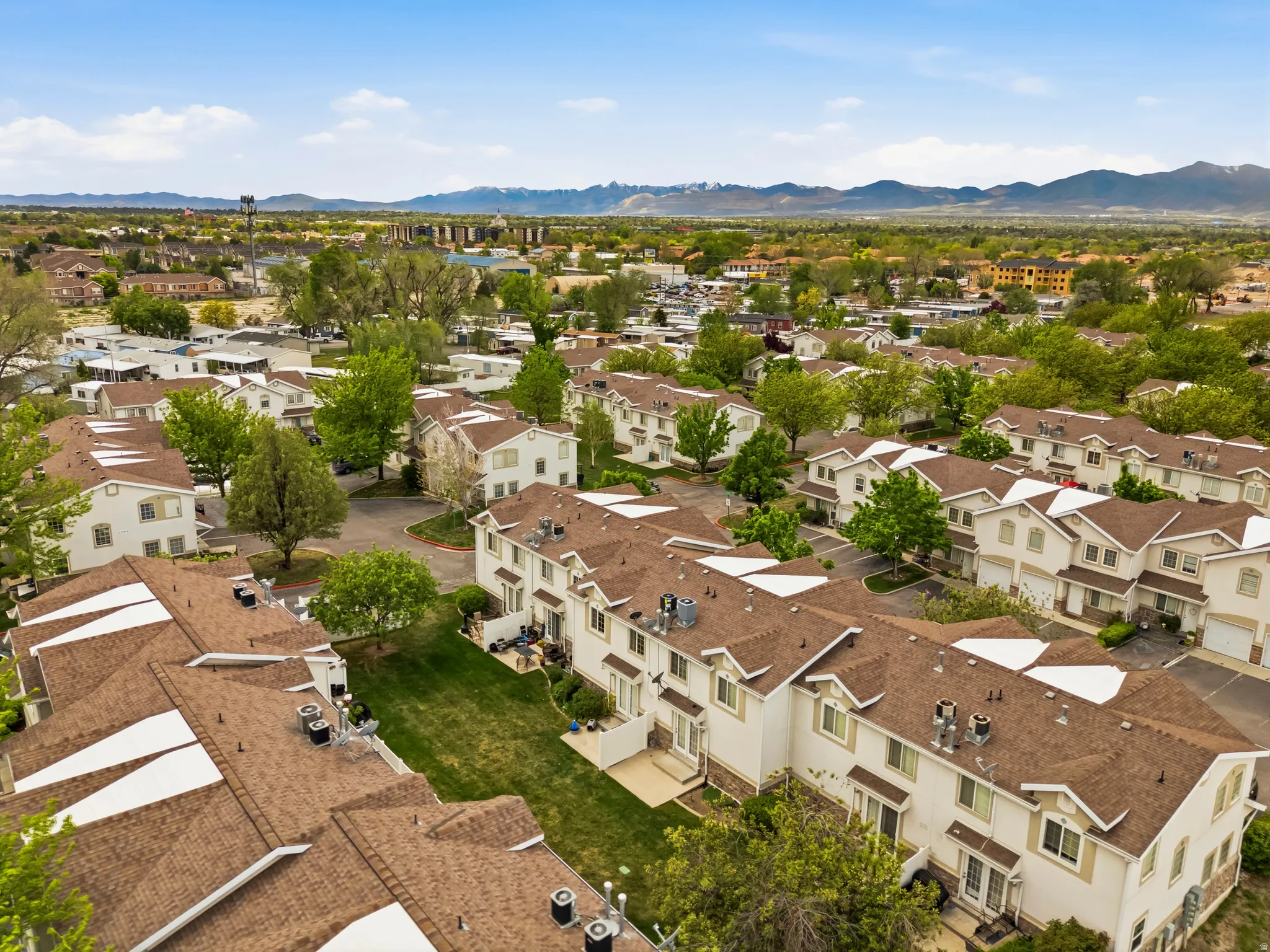Aerial perspective of suburban area with mountains