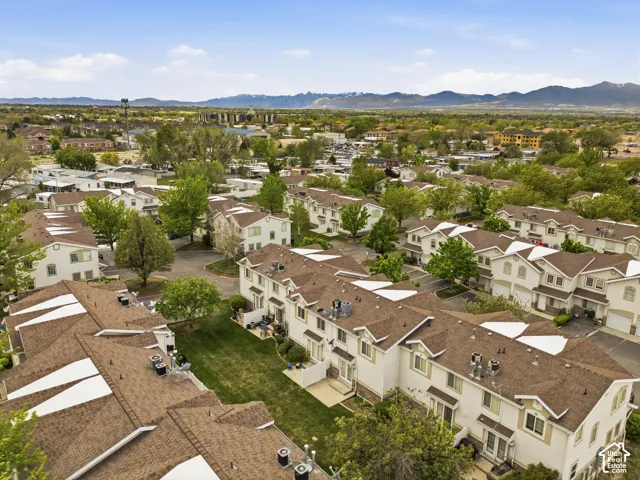 Aerial perspective of suburban area with mountains