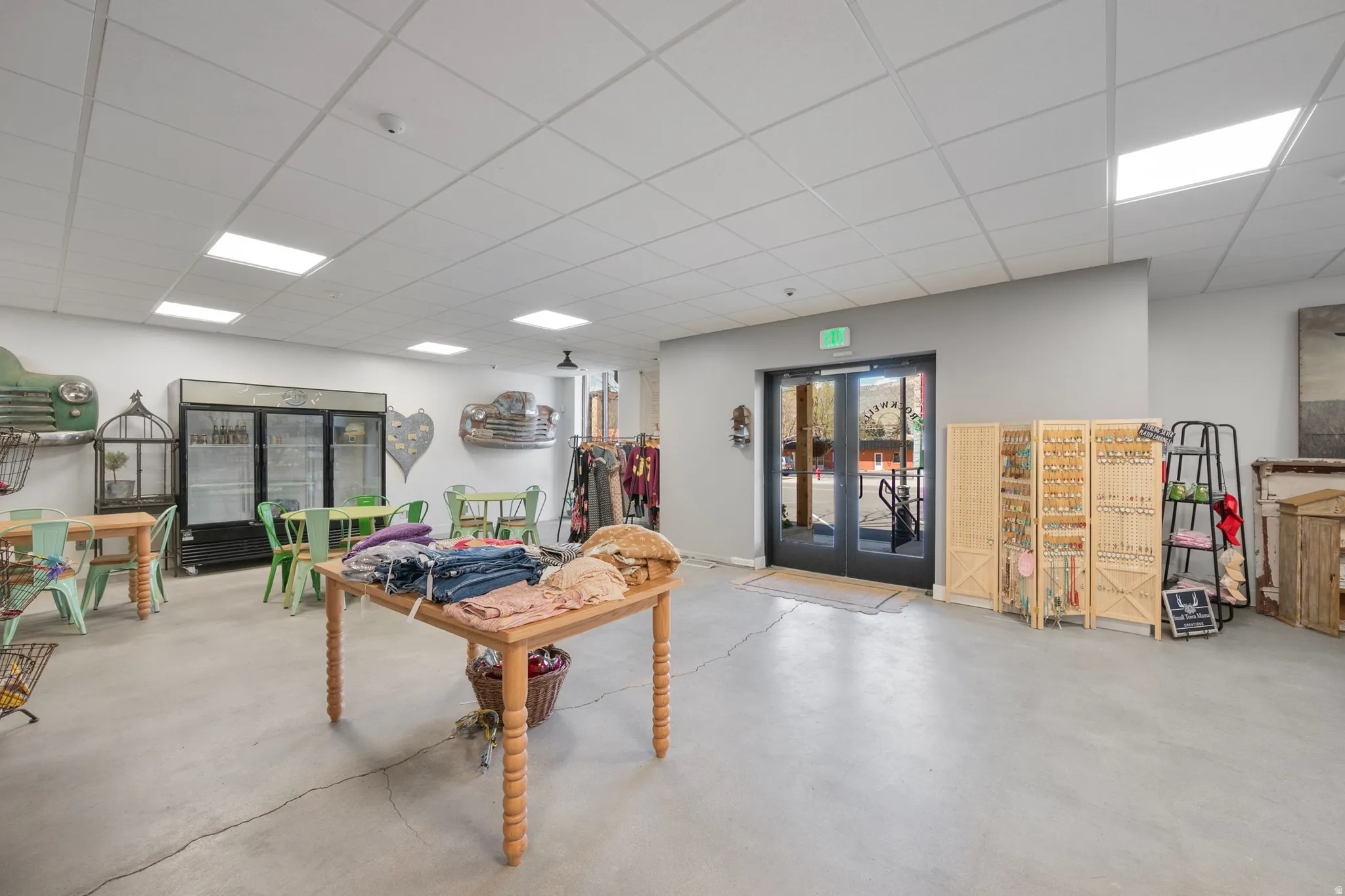 Rec room featuring french doors and a paneled ceiling
